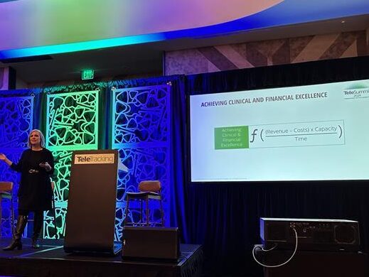 Michelle Skinner on stage presenting at TeleSummit